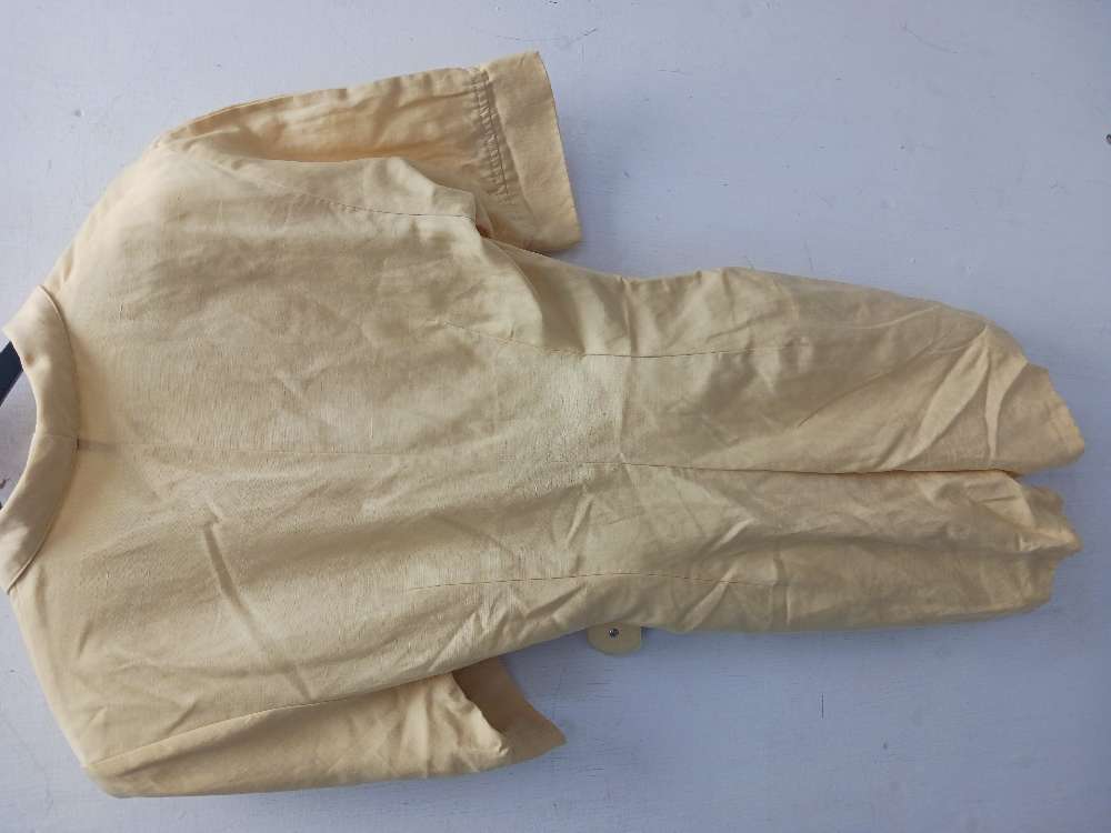 Pta keltainen shortsiasu 34