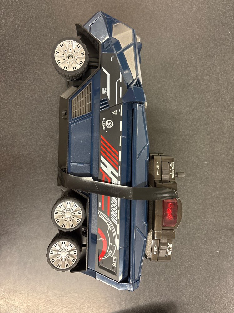 Sininen iso Helimission auto + ohjain