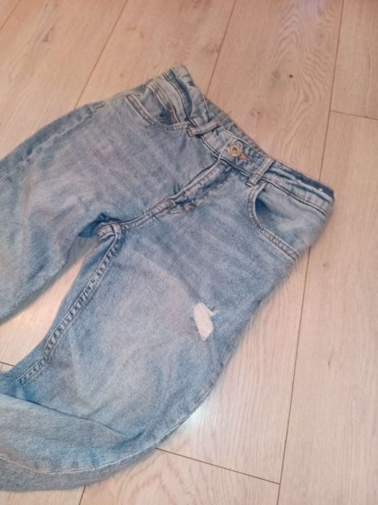 Ljósar gallabuxur St 140.