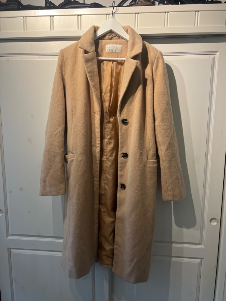 Beige kåpe