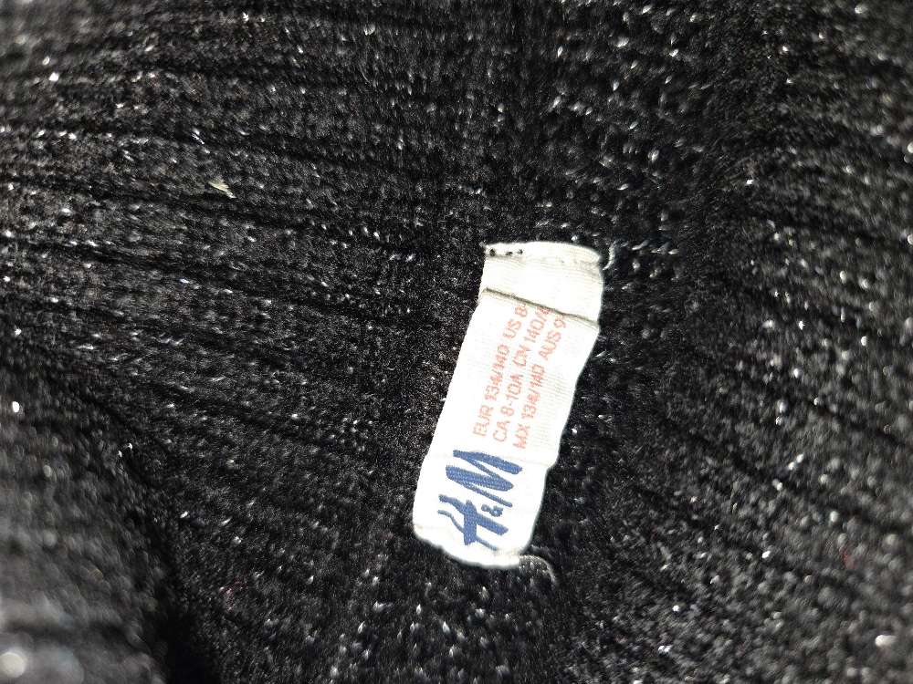 Svört m/silfur rúllukr.peysa st. 134/140