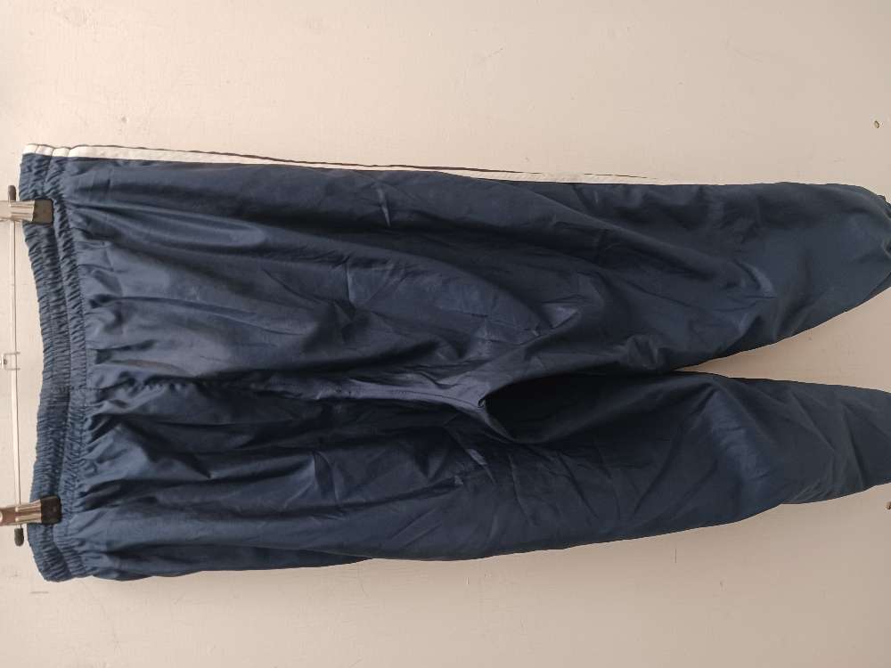 Adidas tuulipuvunhousut XL
