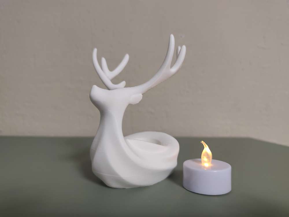 Deer with a candle