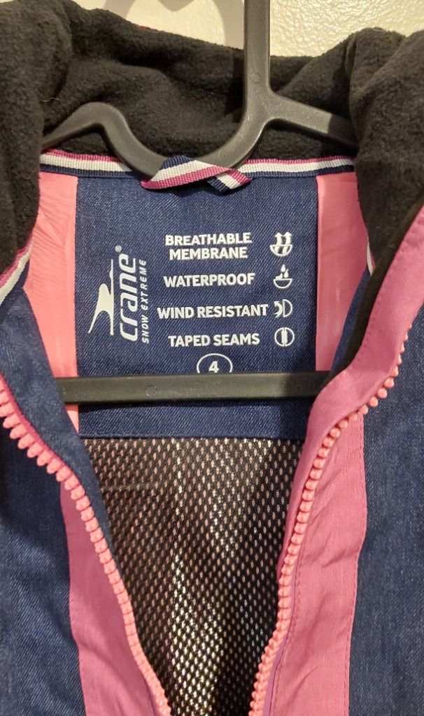 Kaksivärinen hiihtotakki hupulla