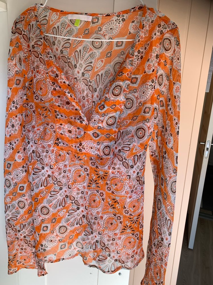 Orange mønstret bluse