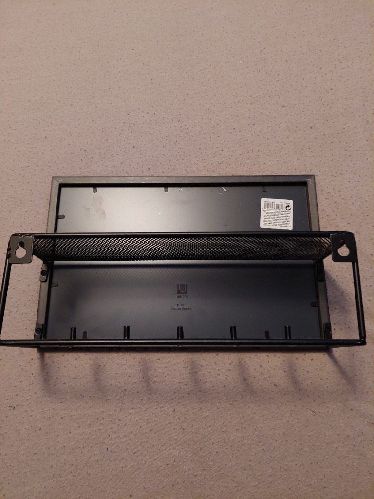 Spegill með snögum