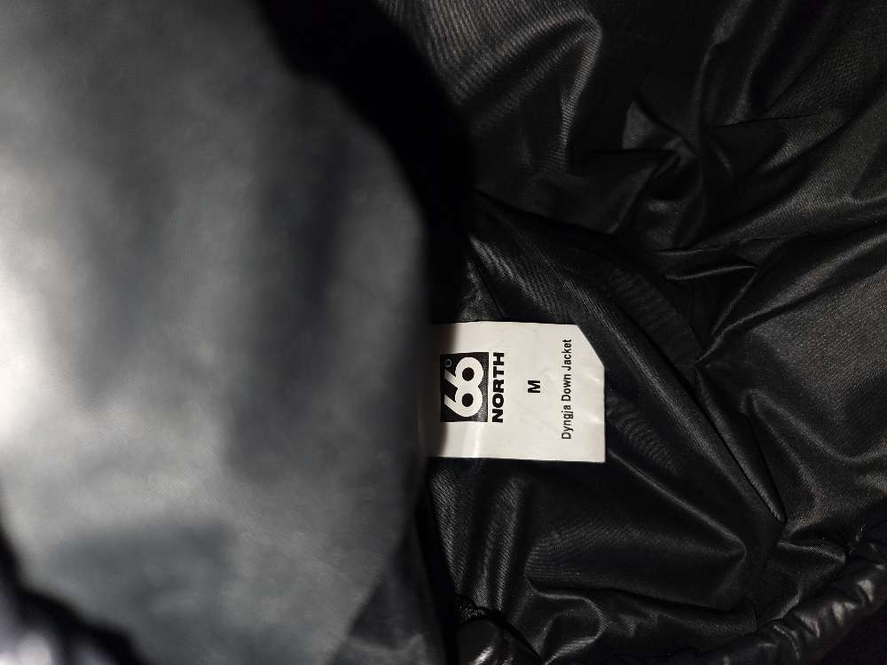 66 svört glans úlpa st.M herra.