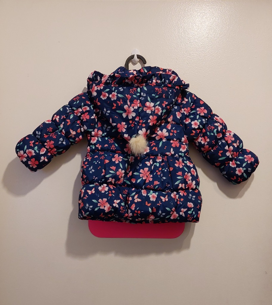 Kirjava tyttöjen talvitakki hupulla