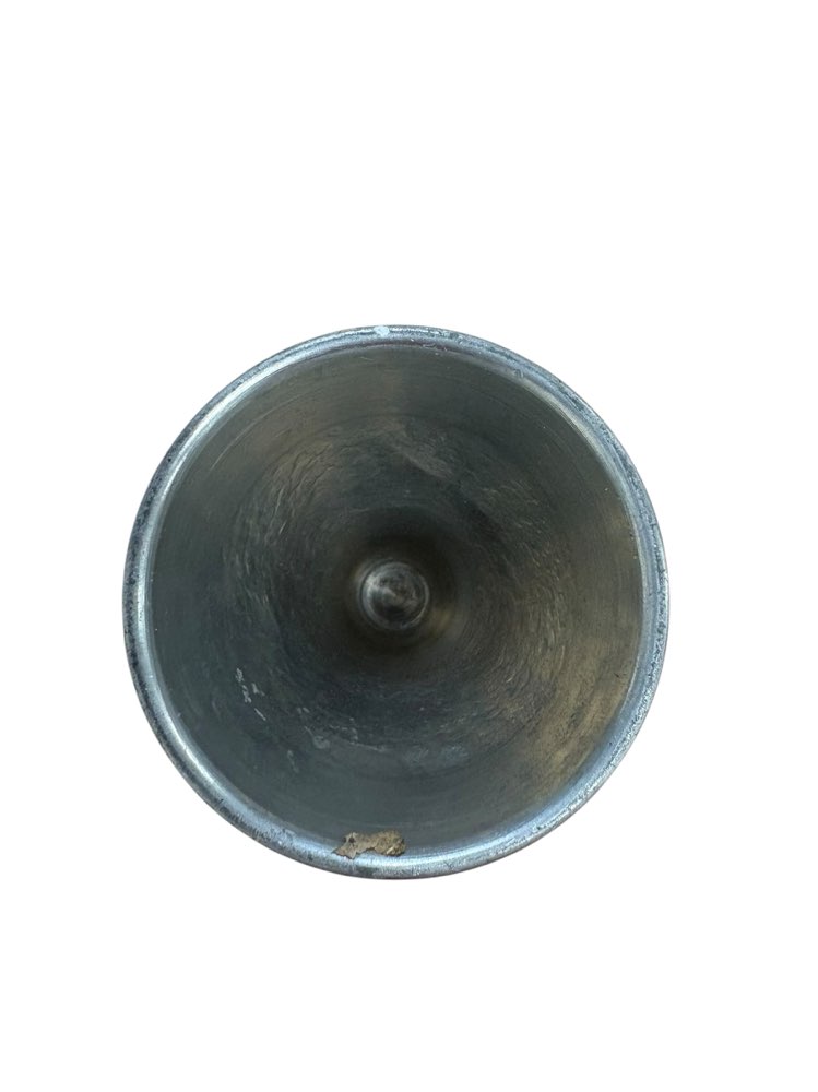 Tina kynttilän jalka