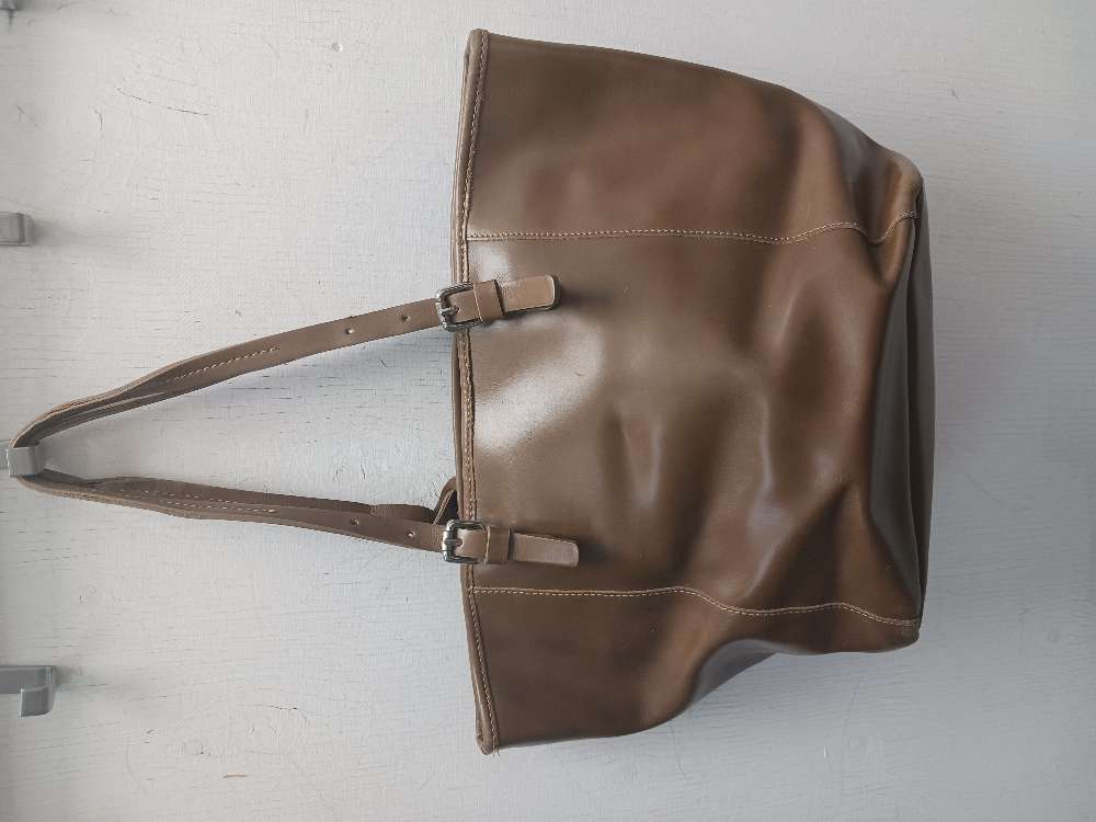 Ruskea gianni laukku