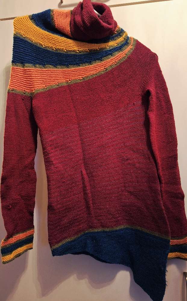 Käsinkudottu monivär piippukaul villap S